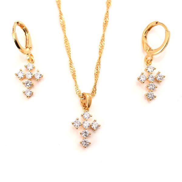 10 kt gold Thai Baht pendant with CZ stones, matching necklace and earrings set featuring a Christian cross design