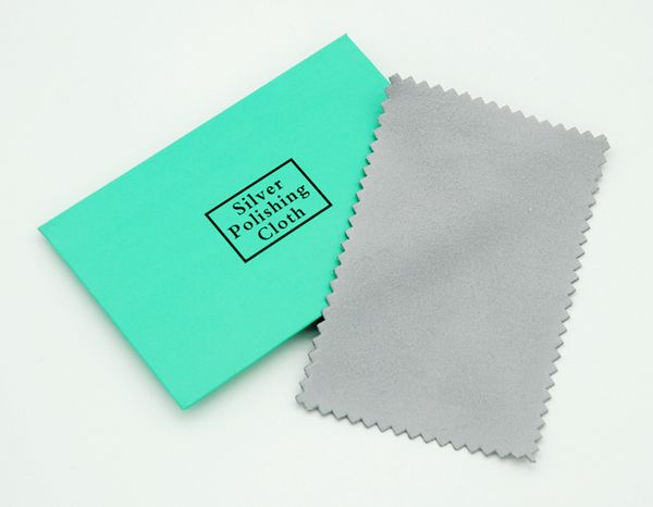 100 pieces of grey silver polishing cloths with packaging for jewelry cleaning and maintenance