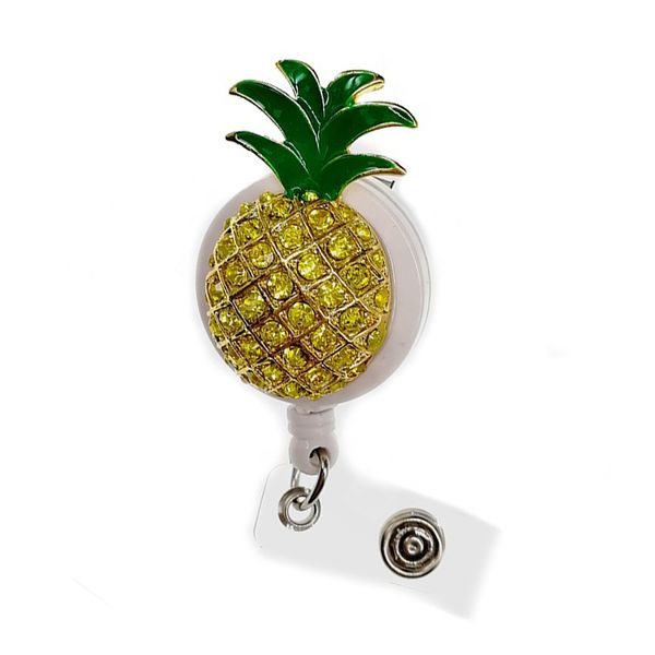 10-piece lot of retractable key rings featuring enamel pineapple designs with rhinestone and crystal accents, ideal for medical badge clips or decorative use