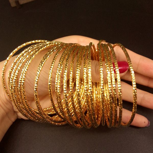10-piece set of women's thin bangle bracelets in 18k yellow gold filled, classic unopenable design, 65mm diameter, 2mm width, ideal as a jewelry gift