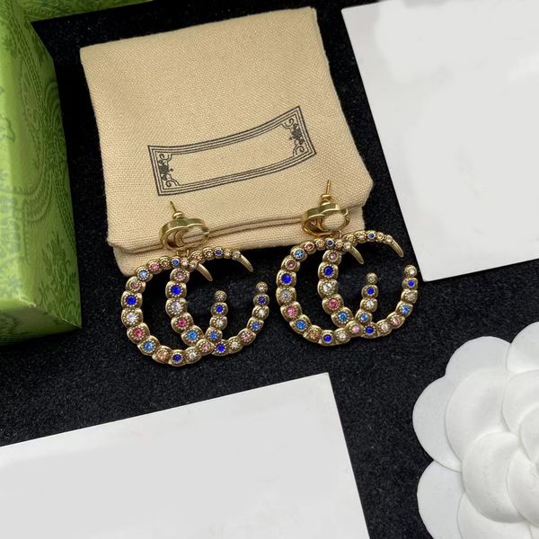 14K gold retro designer chandelier earrings for women, featuring fashion letters and diamond accents, perfect for parties