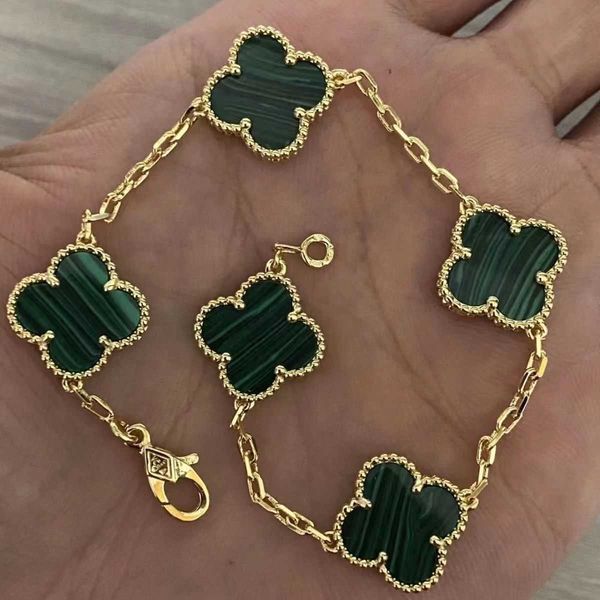 18k gold clover pearl charm bracelet with matching necklace and earrings for weddings