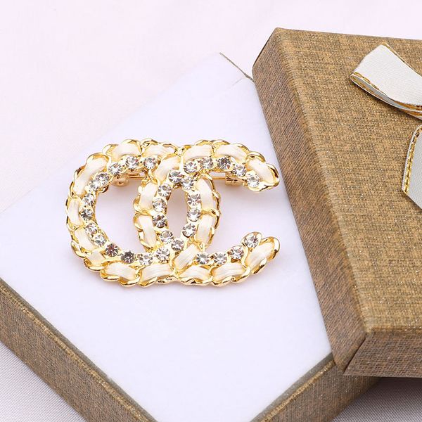 18K gold-plated brooch with designer pearls and crystals, perfect for women's weddings, Christmas parties, and gifts in 20 styles
