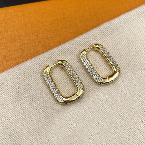 18K gold-plated copper designer ear studs for women, perfect for weddings and parties with a classic style