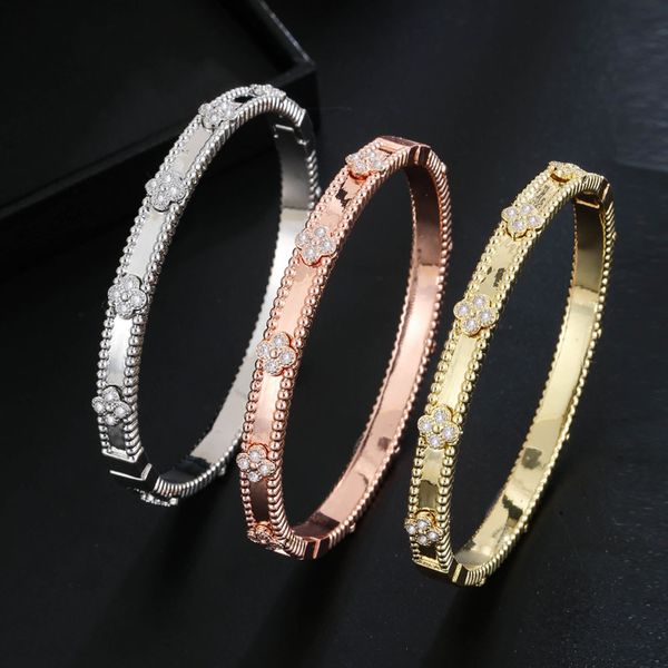 18K gold-plated designer bracelet with sparkling crystals and a four-leaf clover charm, perfect for women as a Valentine's Day gift