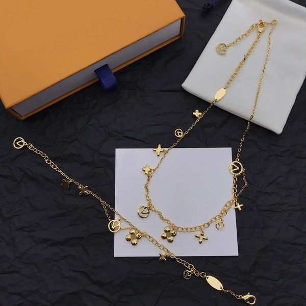 18K gold-plated luxury designer bracelet and necklace set with elegant gold letter detailing