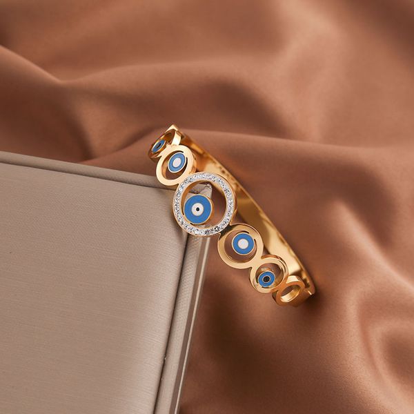18K gold-plated stainless steel evil eye bangle bracelet, perfect as a gift