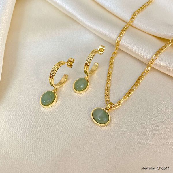 18K gold-plated stainless steel necklace and earrings set featuring green aventurine jade round pendants with a vintage figaro chain design for women