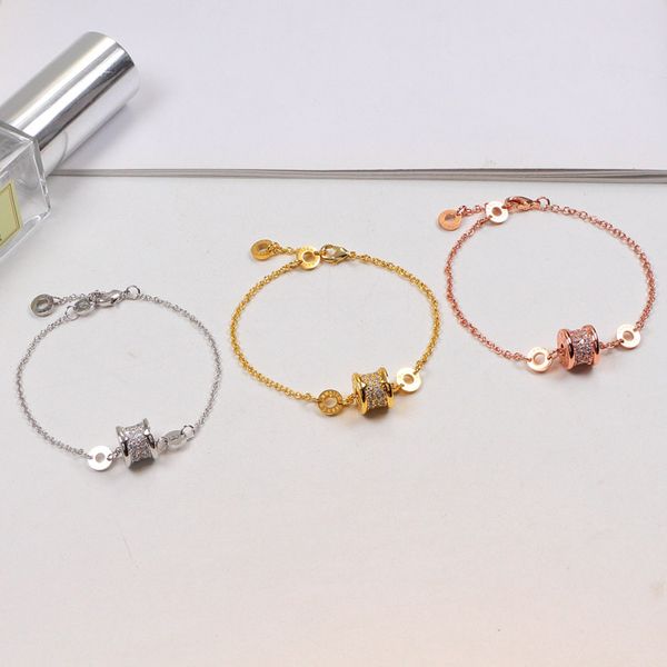 18K rose gold titanium steel bracelet with luxurious diamond-studded bangle design featuring Roman numeral B for stylish couple jewelry