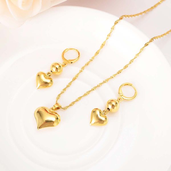 18K yellow gold heart-shaped drop earrings and pendant necklace for women and girls, stylish African jewelry for parties and fashion