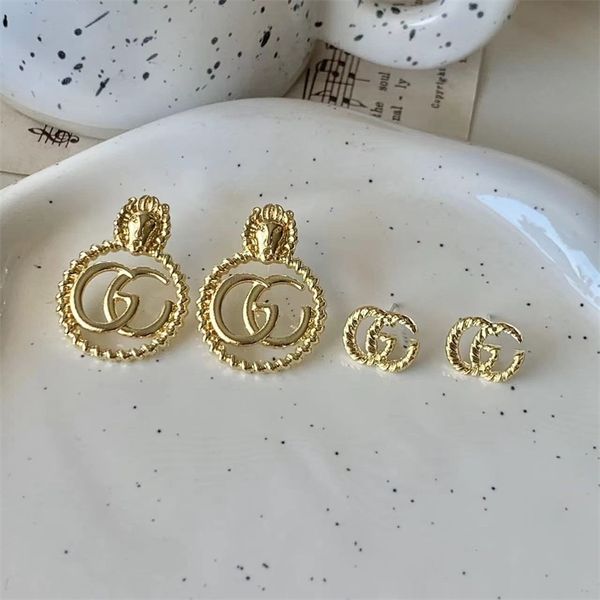 2022 new stylish lion head double letter silver-plated bronze earrings with ethnic charm