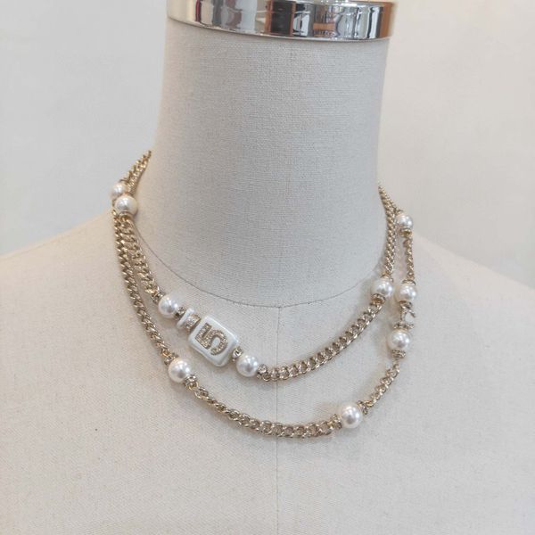 2023 elegant charm necklace featuring a long chain sweater pendant with natural shell beads in bottle shapes, includes box and PS7431B stamp