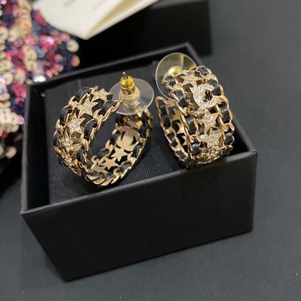 2023 luxury stylish small round hollow drop earrings with black leather and diamond-like design, comes in box stamped PS7472A