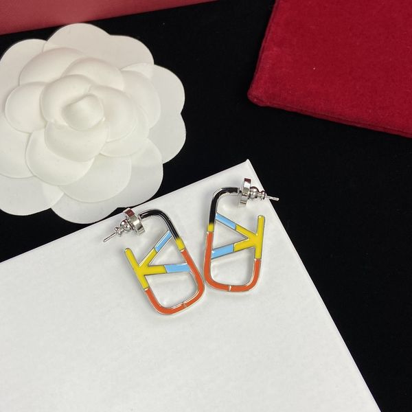 2023 stylish women's earrings featuring gold heart studs with pearls and crystals, crafted in 925 silver for a classic look