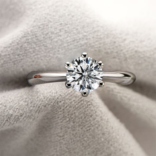 2023 trendy women's wedding ring featuring a 1-carat moissanite solitaire in 925 silver or 18K white gold with certification