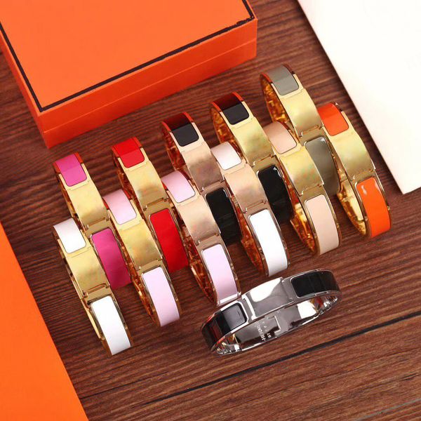 21ss stylish unisex charm bracelets with letter designs, crafted from premium stainless steel featuring gold buckles for a fashionable cuff look
