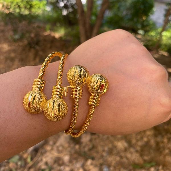 24k gold-plated ball bangles for women, featuring Arabic, Dubai, and Ethiopian bead designs as African jewelry accessories and gifts