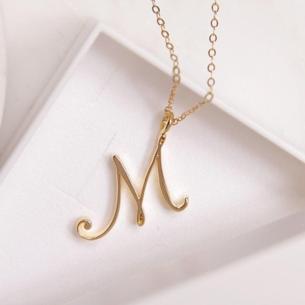 26 elegant cursive initial necklaces in gold and silver, featuring all A-Z letters for stylish monogram word chains