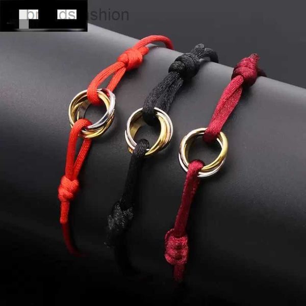 316L stainless steel trinity ring bracelet for couples, featuring three interlinked rings on a stylish hand strap