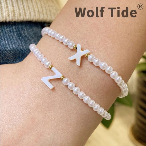 3-4mm pearl beaded initial charm bracelet for women with adjustable A-Z letter designs, a stylish handmade jewelry piece