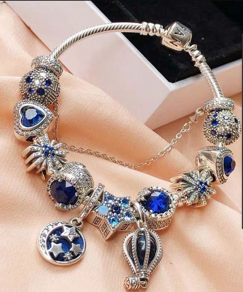 925 sterling silver blue charm bead for European bracelets, featuring wing feather, moon, stars, balloon, and crystal designs, perfect for women's snake chain fashion