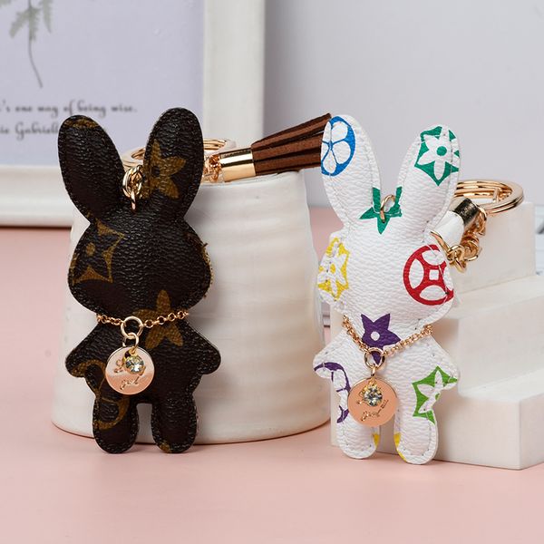Adorable rabbit bunny key rings for women, featuring brown floral plaid PU leather car key holders, stylish bag charms, and jewelry accessories