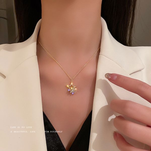 Amulet pendant featuring a rotating zircon flower star design, stylish clavicle chain with trendy personality