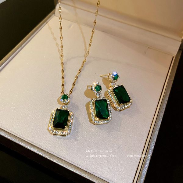 Amulet pendant set featuring 925 silver, zircon, emerald crystals, and geometric designs for elegant earrings and clavicle chains