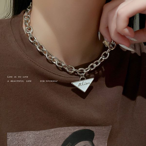 Amulet Pendants Ins Cool Wind Necklace Triangle Letter Thick Chain Personality Exaggerated Neck Trend Clavicle

Rewritten:
Stylish triangle pendant necklace with thick chain for a bold clavicle fashion statement