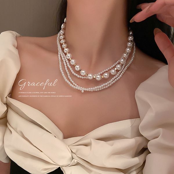 Amulet Pendants South Korea East Gate Fashion Multilayer Pearl Necklace Clavicle Chain Neck Exaggerated Personality Item Jewelry

Rewritten:
Korean fashion amulet pendant necklace with layered pear...