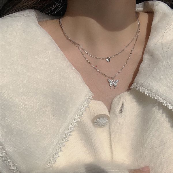Amulet Pendants South Korea East Gate Fashion Simple Personality Necklace Inlaid with Diamond Butterfly Double Neck Chain Net Red Temperamen

Rewritten:
Korean amulet pendants from East Gate featuring a stylish double-chain necklace with diamond butterfly accents in a bold red design