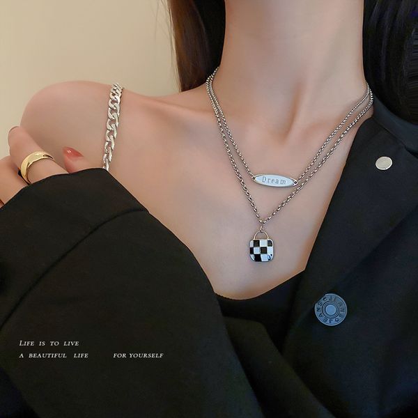 Amulet Pendants with Korean-inspired Fashion: Oil Drip Design on Black and White Checkered Bag Charm, Double Layer Necklace for a Stylish Clavicle Look