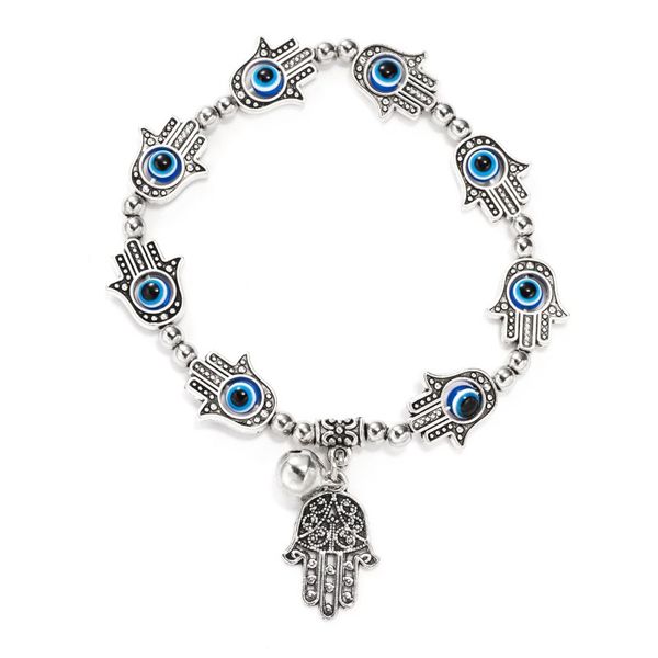 Antique silver-plated Fatima hand bracelet with blue evil eye charm and tiny bell