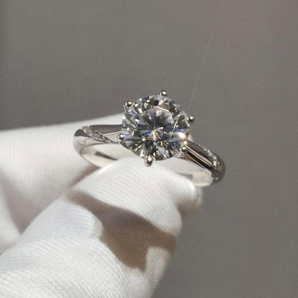Authentic 925 silver cluster ring with 18k white gold plating, featuring a D-color moissanite in brilliant cut, tested as diamond equivalent solitaire stone