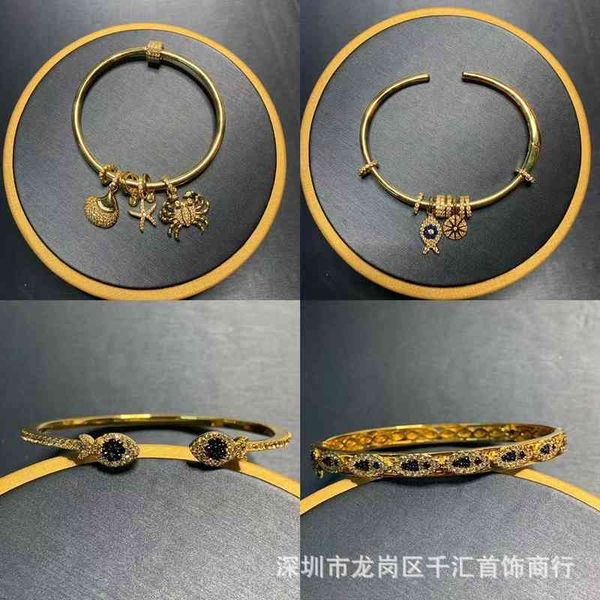Bangle charm bracelet featuring an adjustable lucky fish design for Pisces women, inspired by underwater themes
