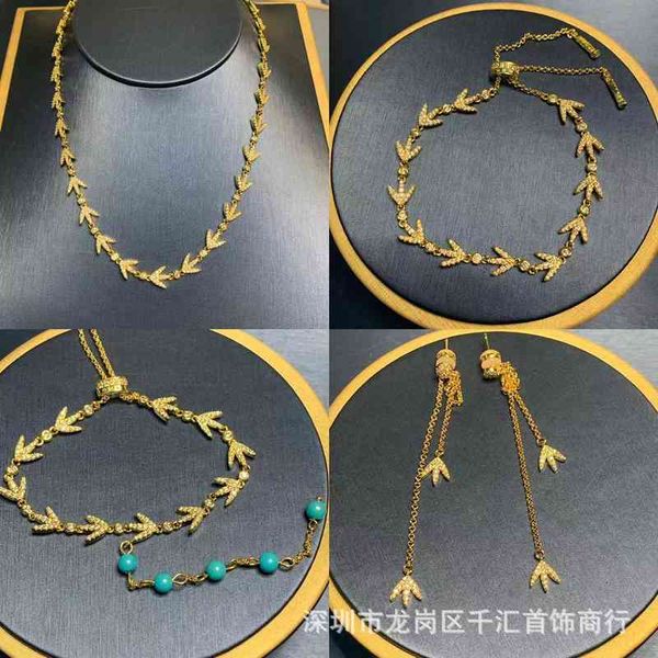 Bangle Charm Bracelets: Elegant charm-adorned bangle bracelets  
Family Laurel Leaf Necklace: A laurel leaf pendant symbolizing family bonds  
Female Turquoise Bracelet: Stylish turquoise bracelet ...