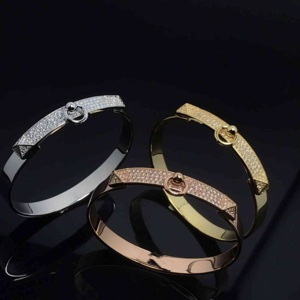 Bangles and bracelets featuring the letter "H" in a stylish Kelly half-diamond design, crafted from titanium steel with an elegant 18k rose gold plating, ideal for pig nose lovers