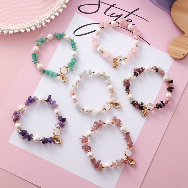 Bohemian-style bracelet featuring natural stone strands and shell pearls