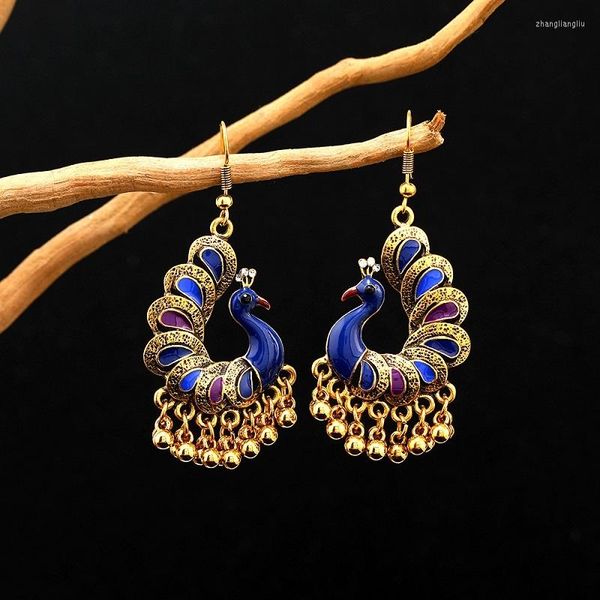 Boho retro peacock drop earrings for women in ethnic bohemian style, perfect vintage festival accessories