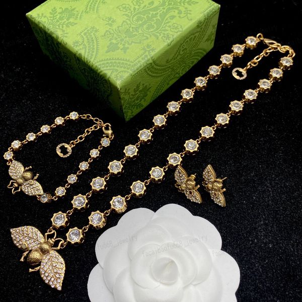 Brass jewelry set featuring zircon bee alphabet designs, combining classic style with modern fashion