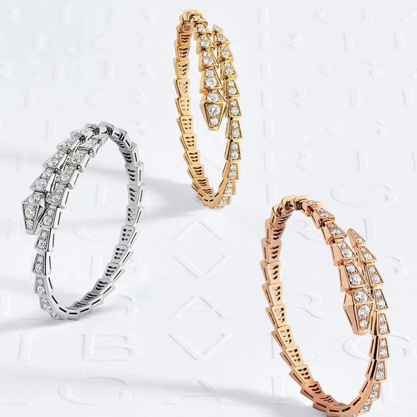 BUIGARI's 18K gold-plated Serpentine bangle with diamonds, a luxurious women's fashion piece and anniversary gift that maintains its shine