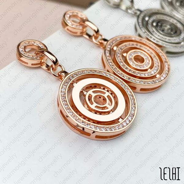 Bulgarian hoop earrings with diamond studs in rose gold, elegant drop earrings, stylish large gold hoops from topbrandjewelry, exquisite jewelry and bracelets