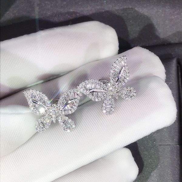 Butterfly stud earrings with AAAAA cubic zirconia stones, genuine 925 sterling silver, perfect for weddings, parties, and bridal jewelry