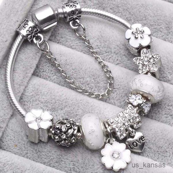 Charm Bracelets 925 Sterling Silver Original Pandora Moments Bracelet Three Spring Colors Shili Peach Blossom DIY Jewelry Women Girl R230712

Rewritten:
Original Pandora Moments charm bracelet in 925 sterling silver with three spring colors and peach blossom design for women and girls to DIY