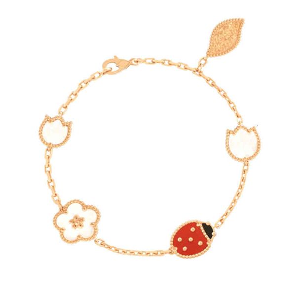 Charm bracelets featuring Japanese and Korean design aesthetics with hand-decorated four-leaf flowers, butterfly wings, white fritillaria, five-grass patterns, and red chalcedony accents