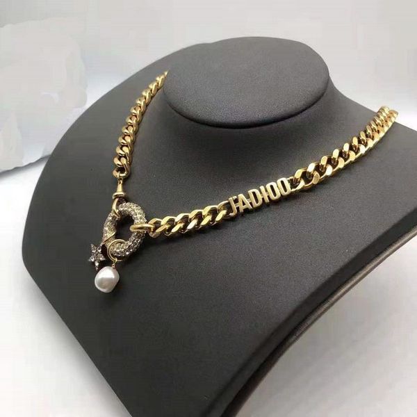 Chic 14k gold necklace for ladies featuring letter, diamond circle, star, and pearl designs, perfect for weddings and clavicle chains