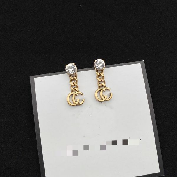Chic double-letter charm earrings featuring an embossed stamp design, perfect for women's parties and anniversaries, come with a gift box
