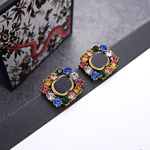 Chic double-letter charm earrings featuring an embossed stamp design, perfect for women's parties and anniversaries, come with a gift box