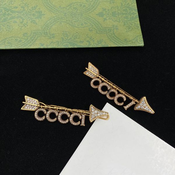Chic double-letter charm earrings featuring an embossed stamp design, perfect for women's parties and anniversaries, come with a gift box