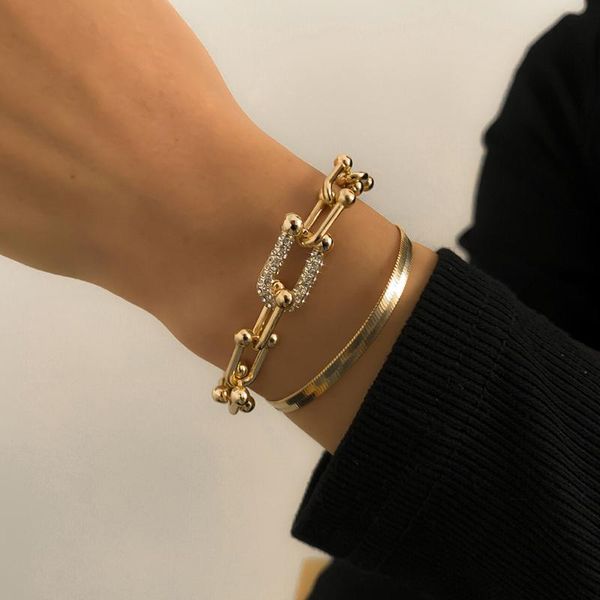 Chic gold-tone snake chain charm bracelets for women, adorned with crystals, a stylish hand accessory jewelry set